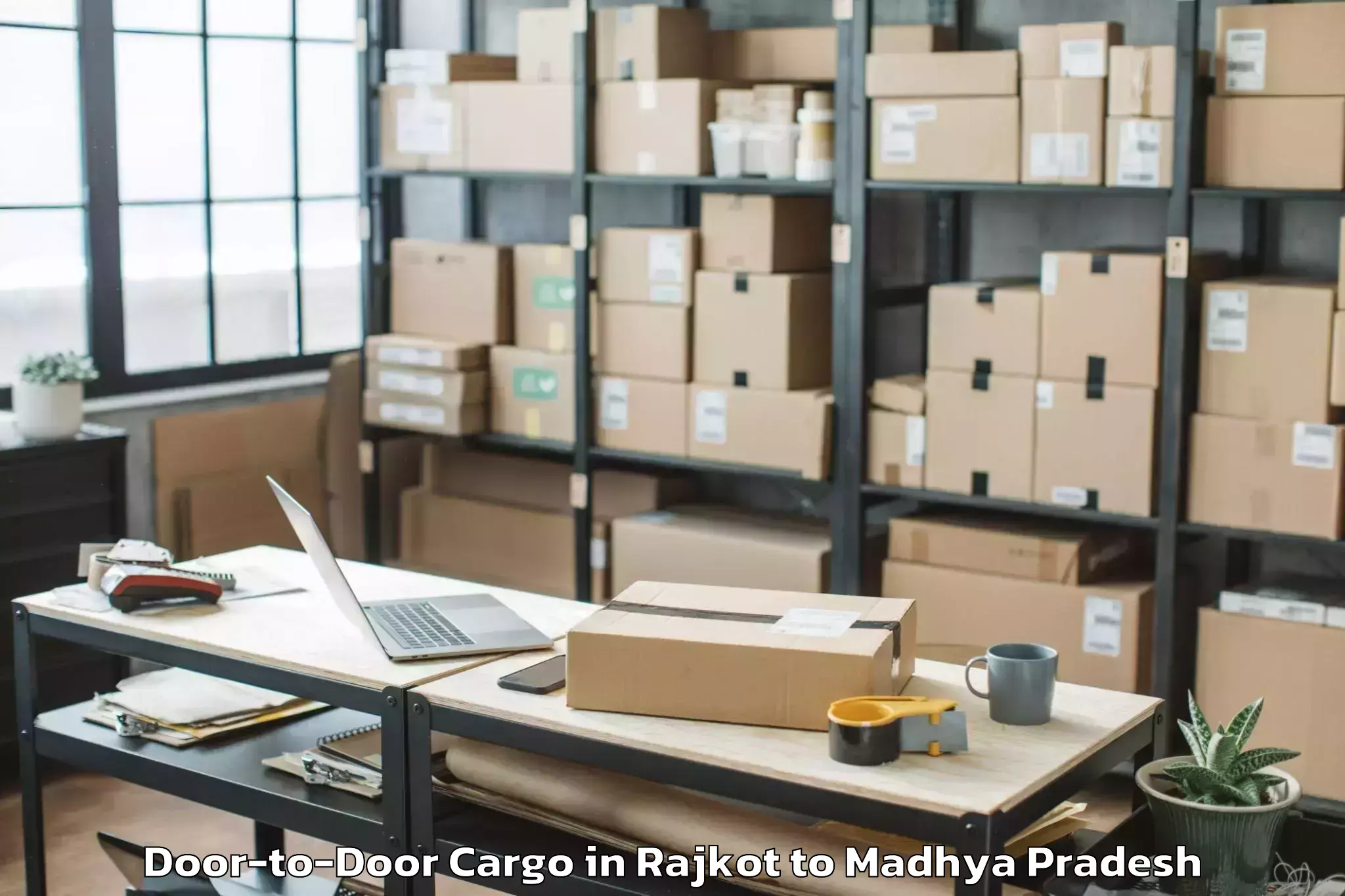 Professional Rajkot to Gautampura Door To Door Cargo